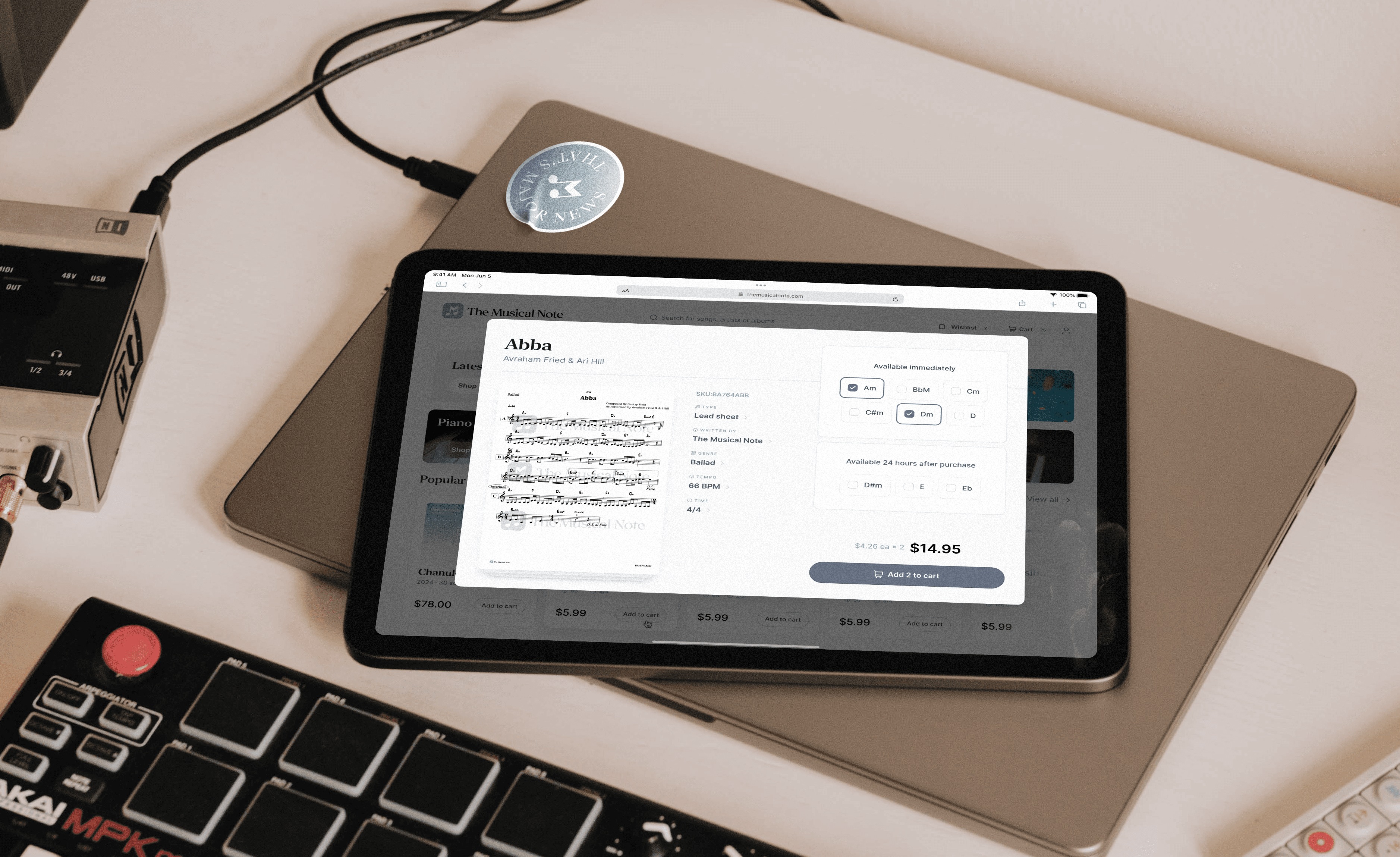 ipad air in studio setting showing themusicalnote.com on the screen