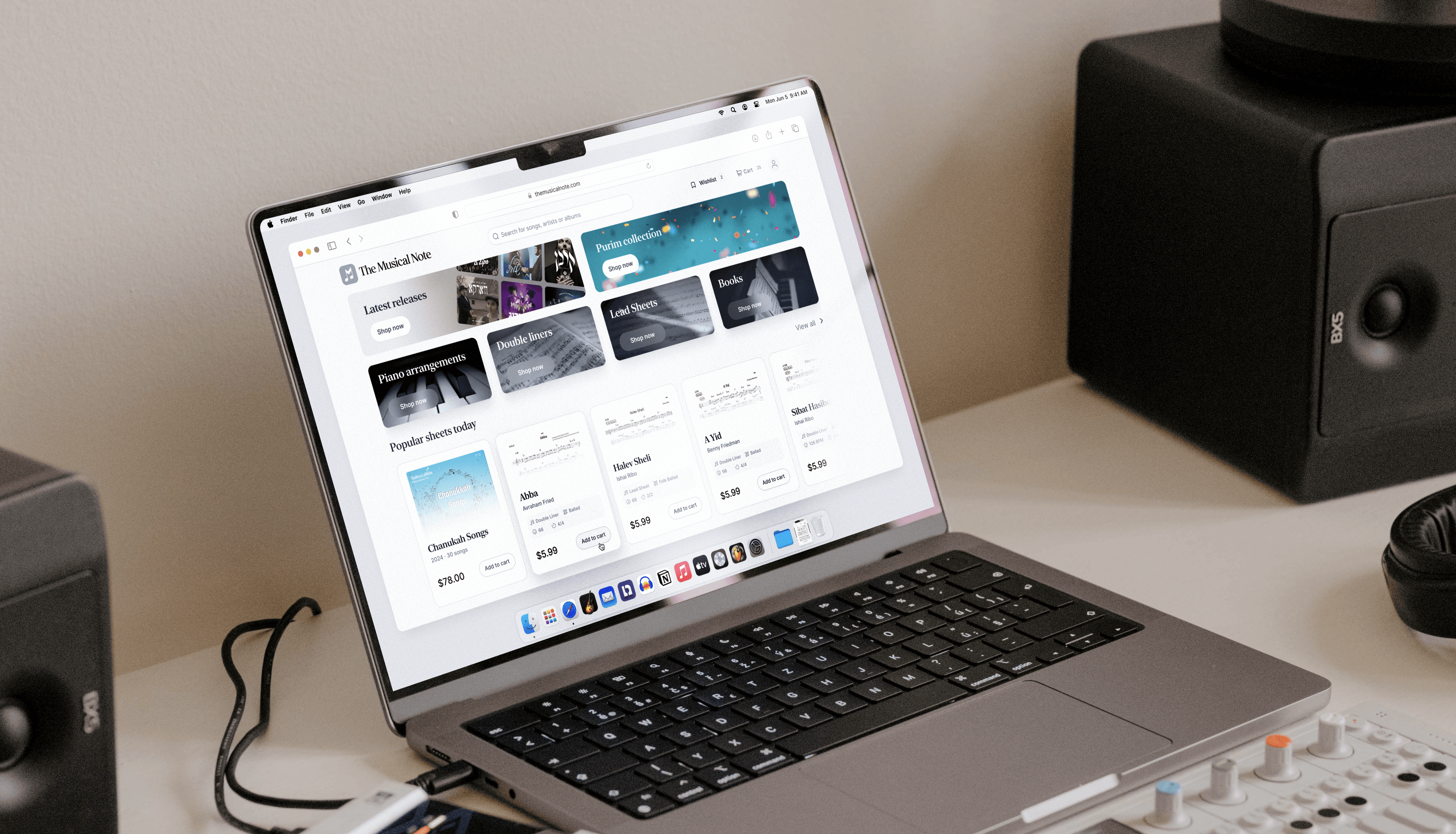 MacBook Pro- The Musical Note website in the Small Podcast Studio